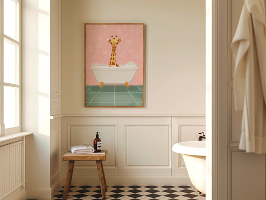 Bathroom interior with a framed artwork of a giraffe in a bathtub on the wall.