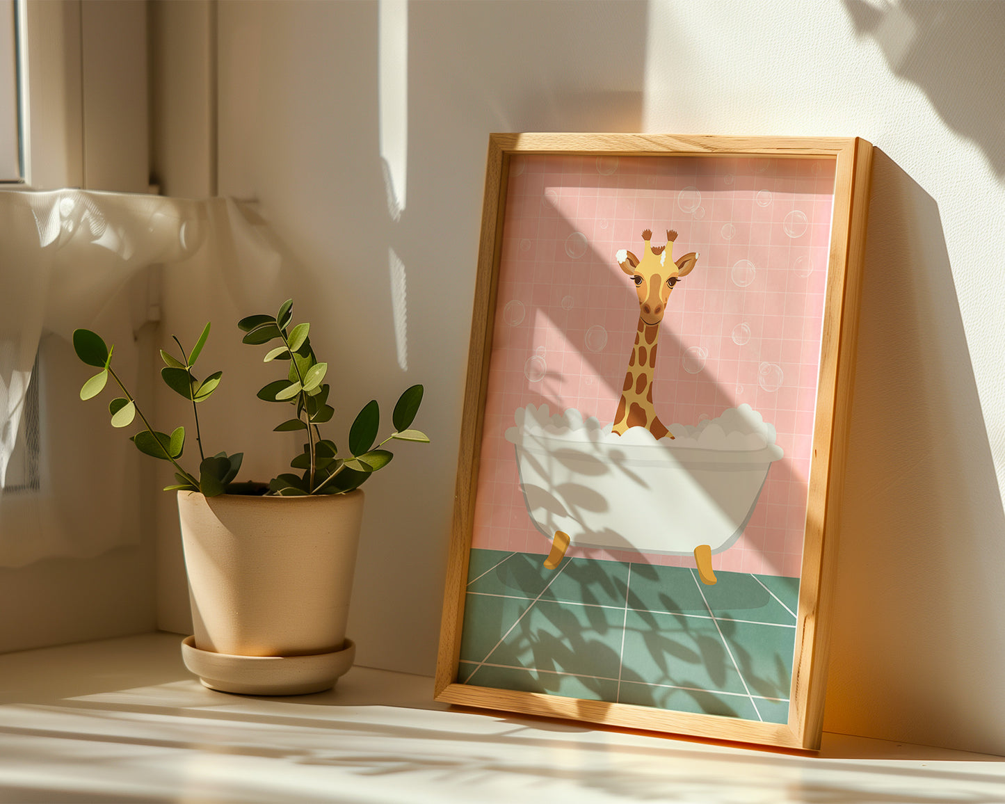 Framed artwork of a giraffe taking a bath next to a potted plant on a windowsill.