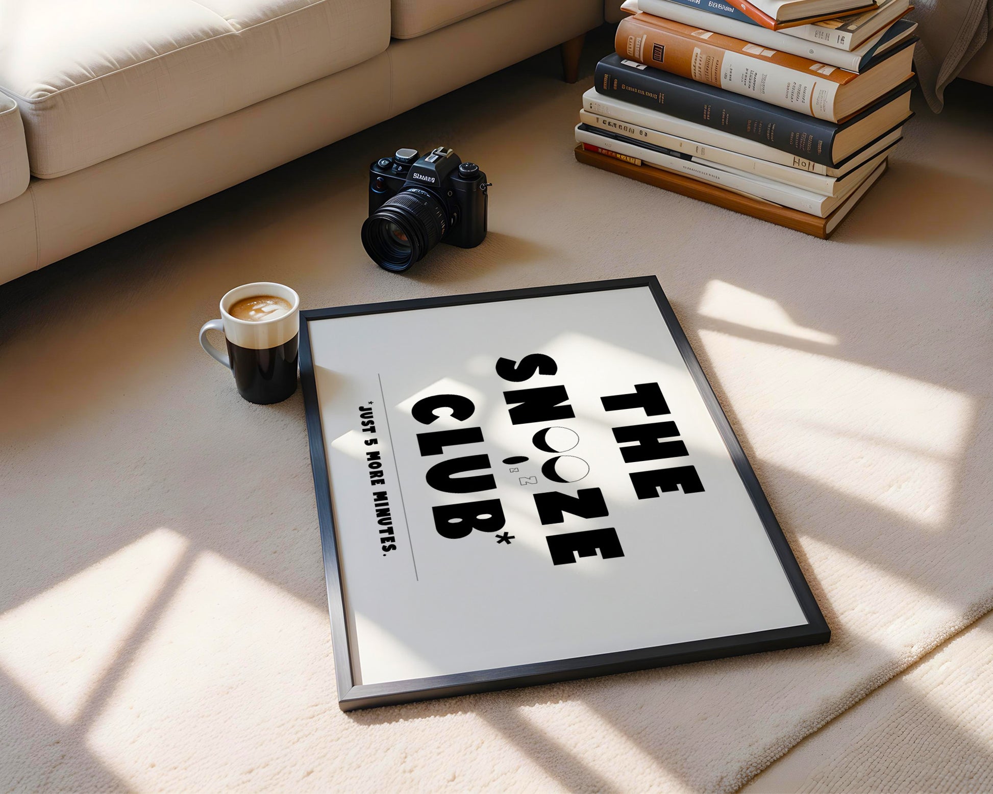 "Unframed typographic print with a bold ‘The Snooze Club’ design, the perfect gift for those who love to snooze."